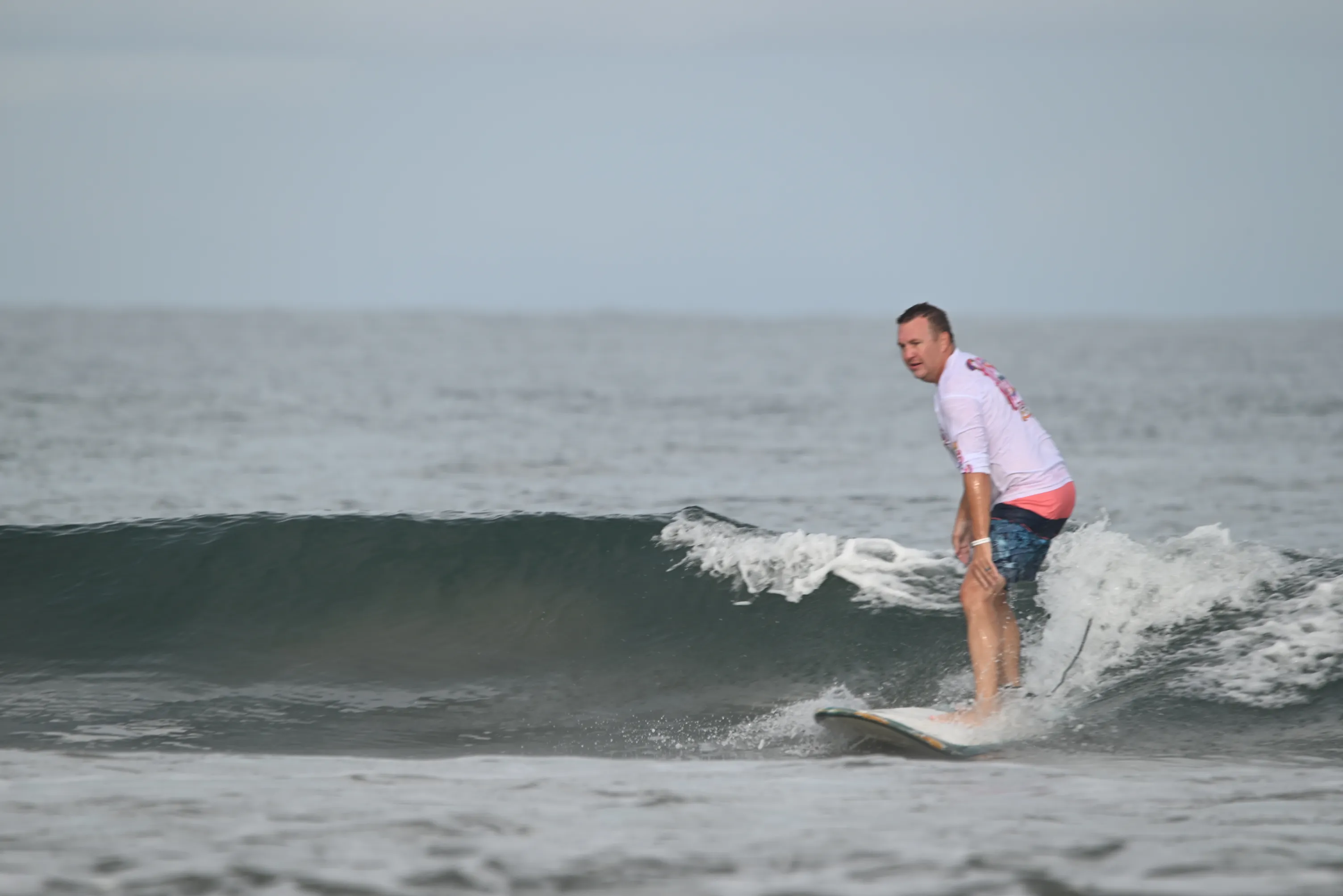 Kids surf lesson at Cocoa Beach Florida at sunset