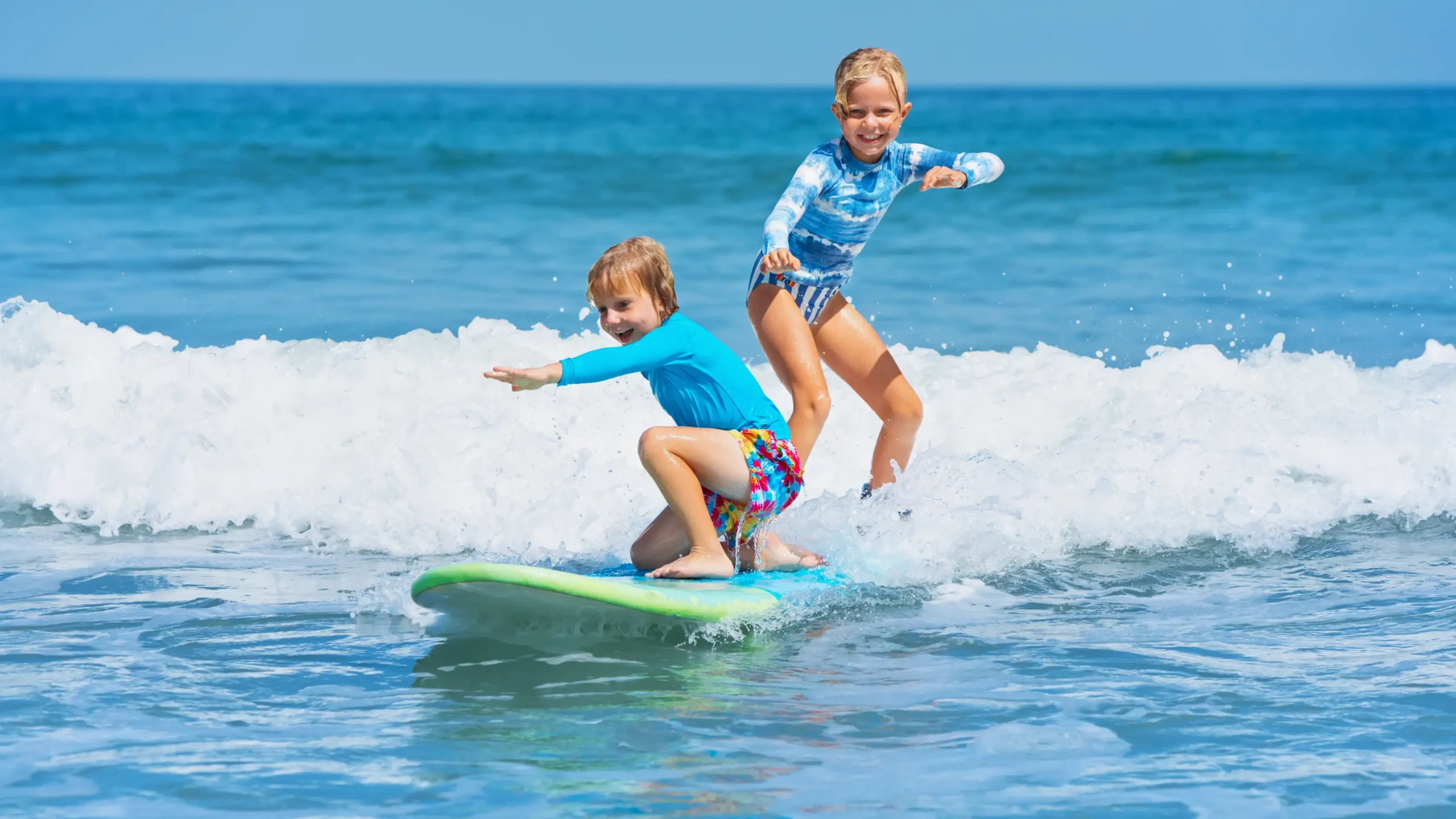 happy students surfing in Florida